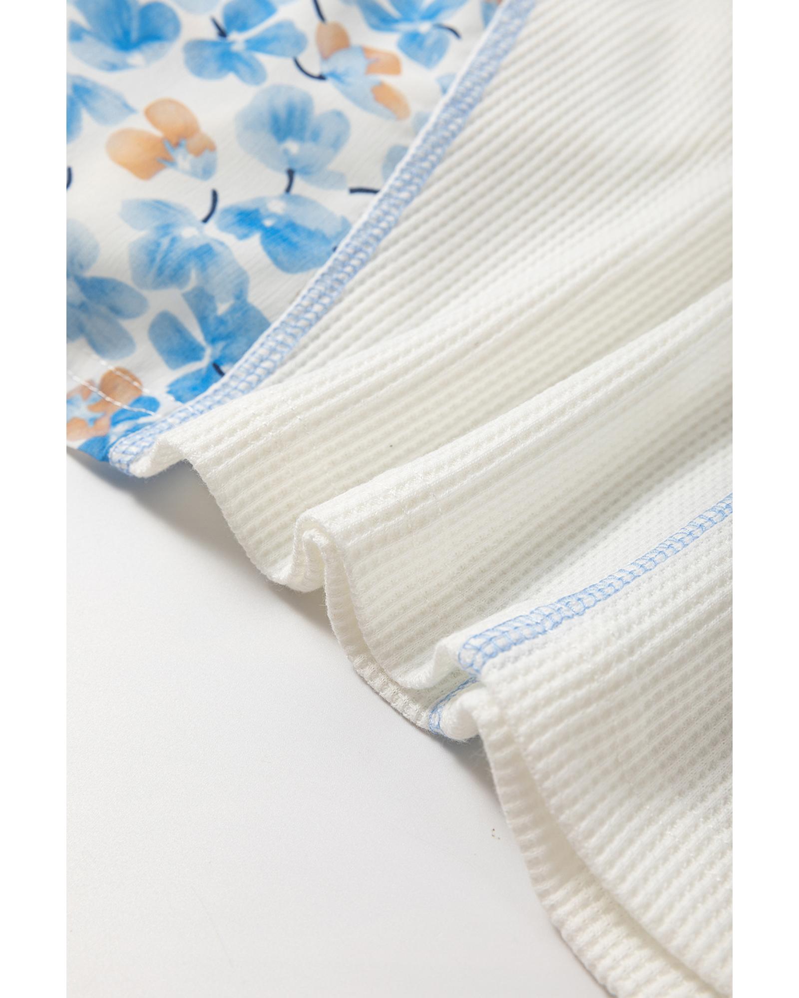 V539-AZEXDC25128384-P1-XL-202508270100-00 White Abstract Floral Patchwork Batwing Sleeve V Neck Blouse - XL - Image 1