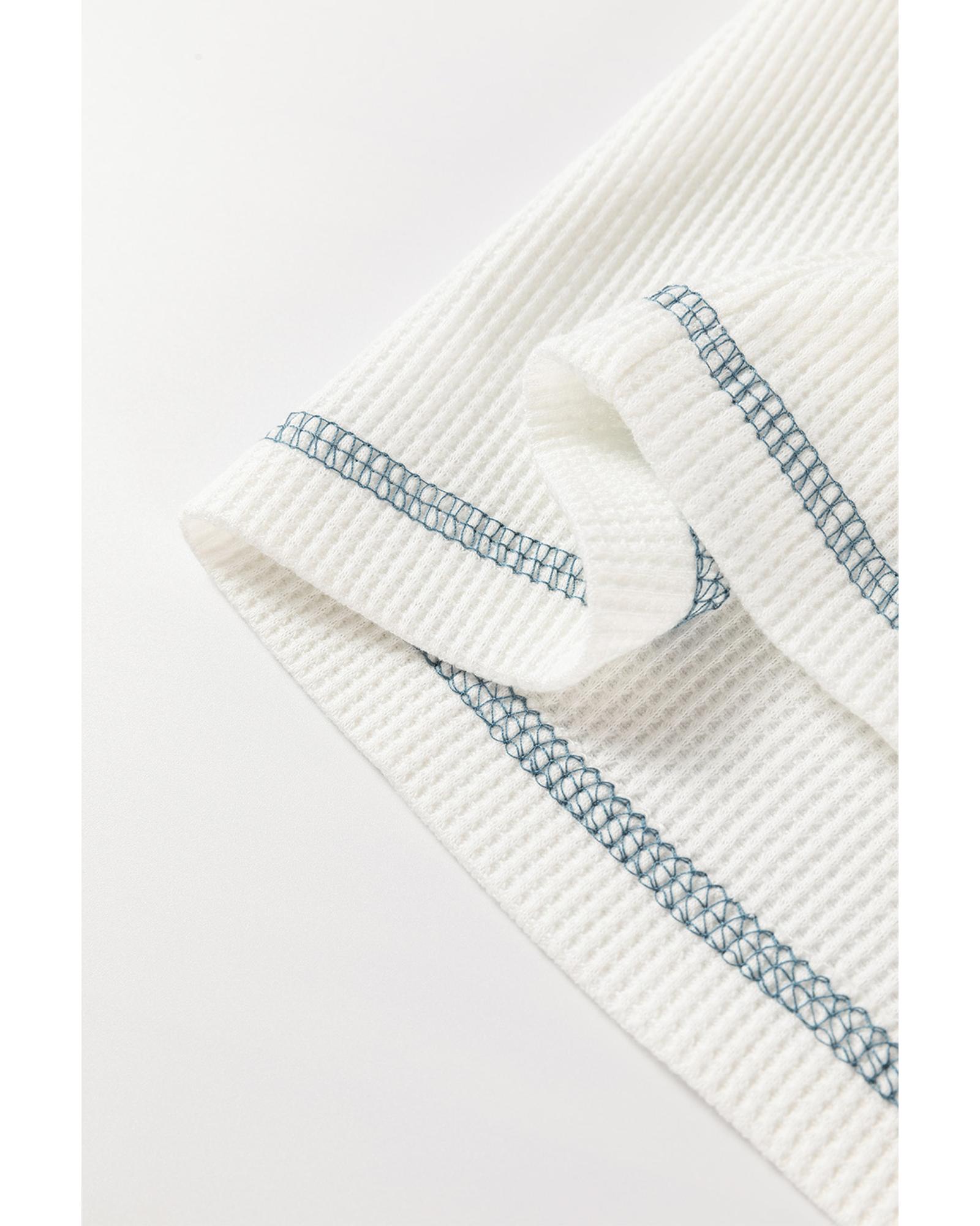 V539-AZEXDC25129371-P1-L-202508271520-00 White Floral Patchwork Waffle Knit Raglan Top - L - Image 1