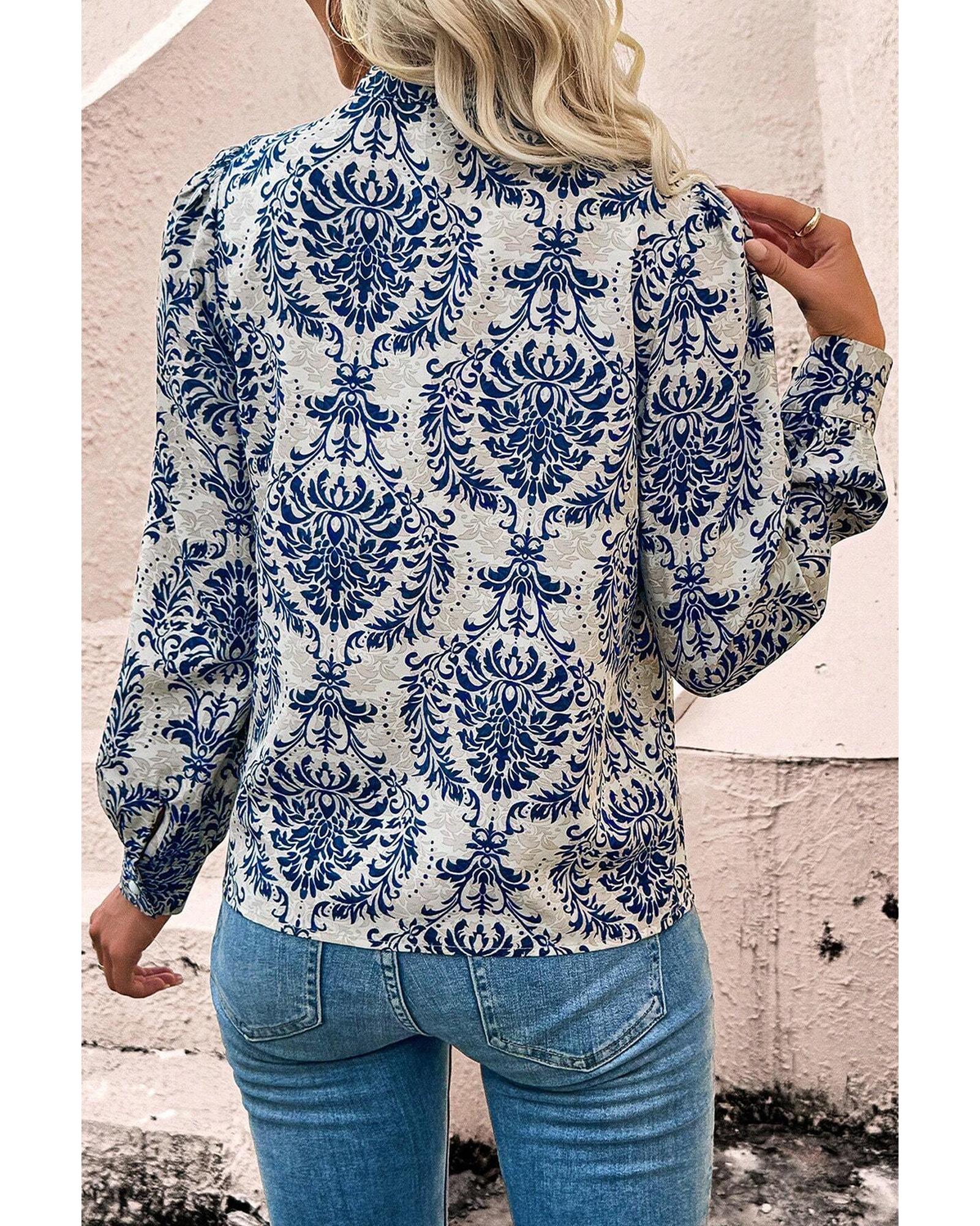 V539-AZEXPL2555343-P420-4X-202508302345-00 Sky Blue Tribal Pattern Print Notch Neck Buttoned Plus Size Shirt - 4X - Image 1