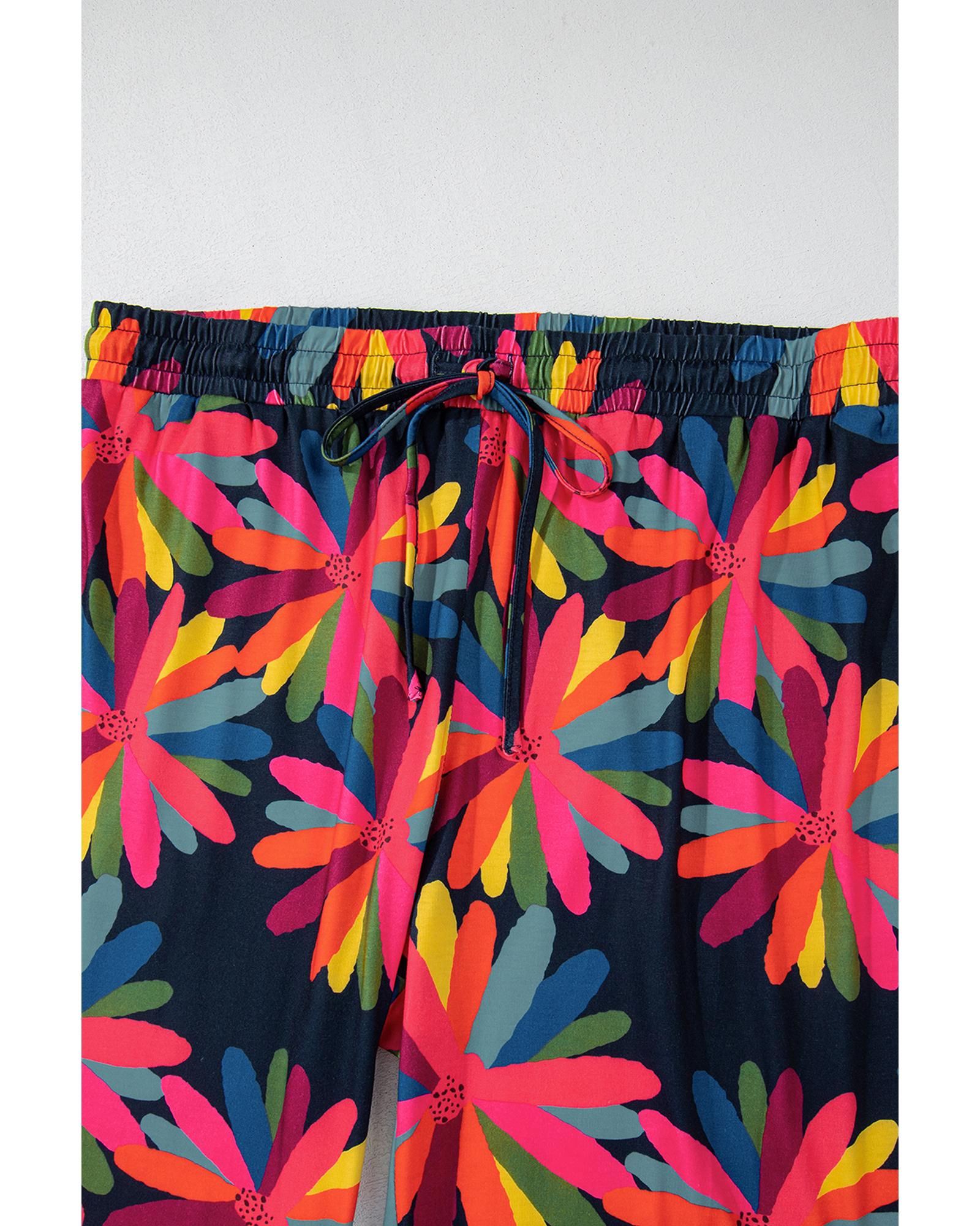 V539-AZEXPL62149-P220-1X-202506152225-00 Black Plus Size Printed Long Sleeve and Pants Lounge Set - 1X - Image 1