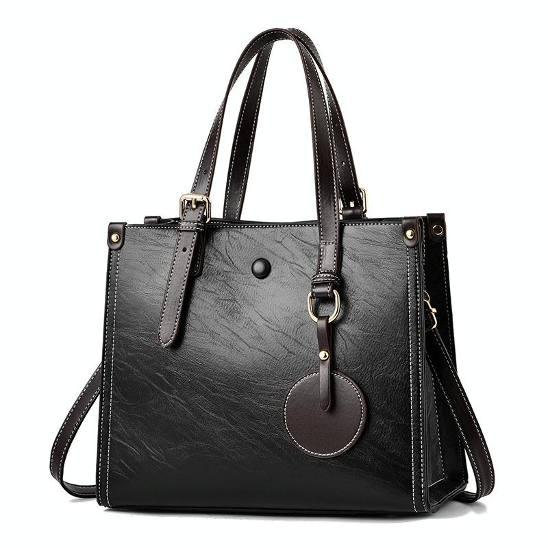 V562-C1050232060DBT-202504251637-00 Vintage Multifunctional Handbag for Women - Black - Image 1