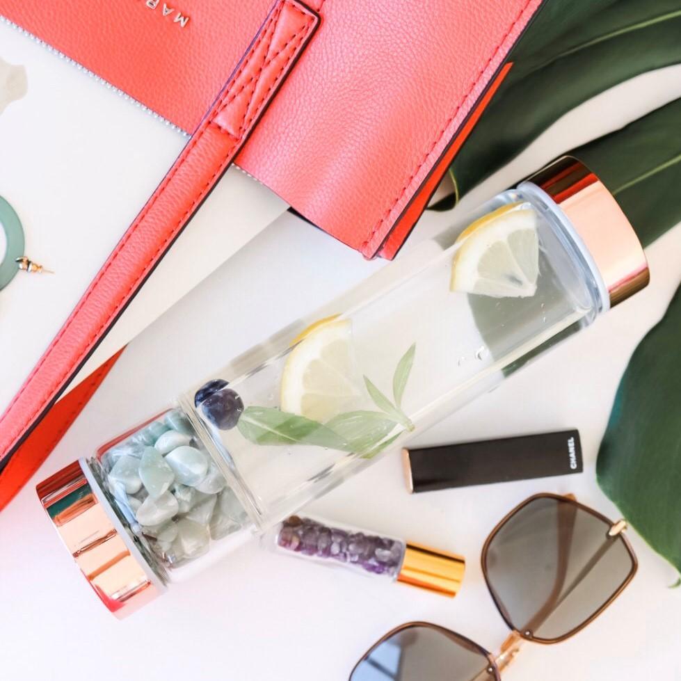 V573-CWBGBBO-140180-00 Rose Gold Crystal Bottle with Gemstone Base and Tea Infuser - Image 1