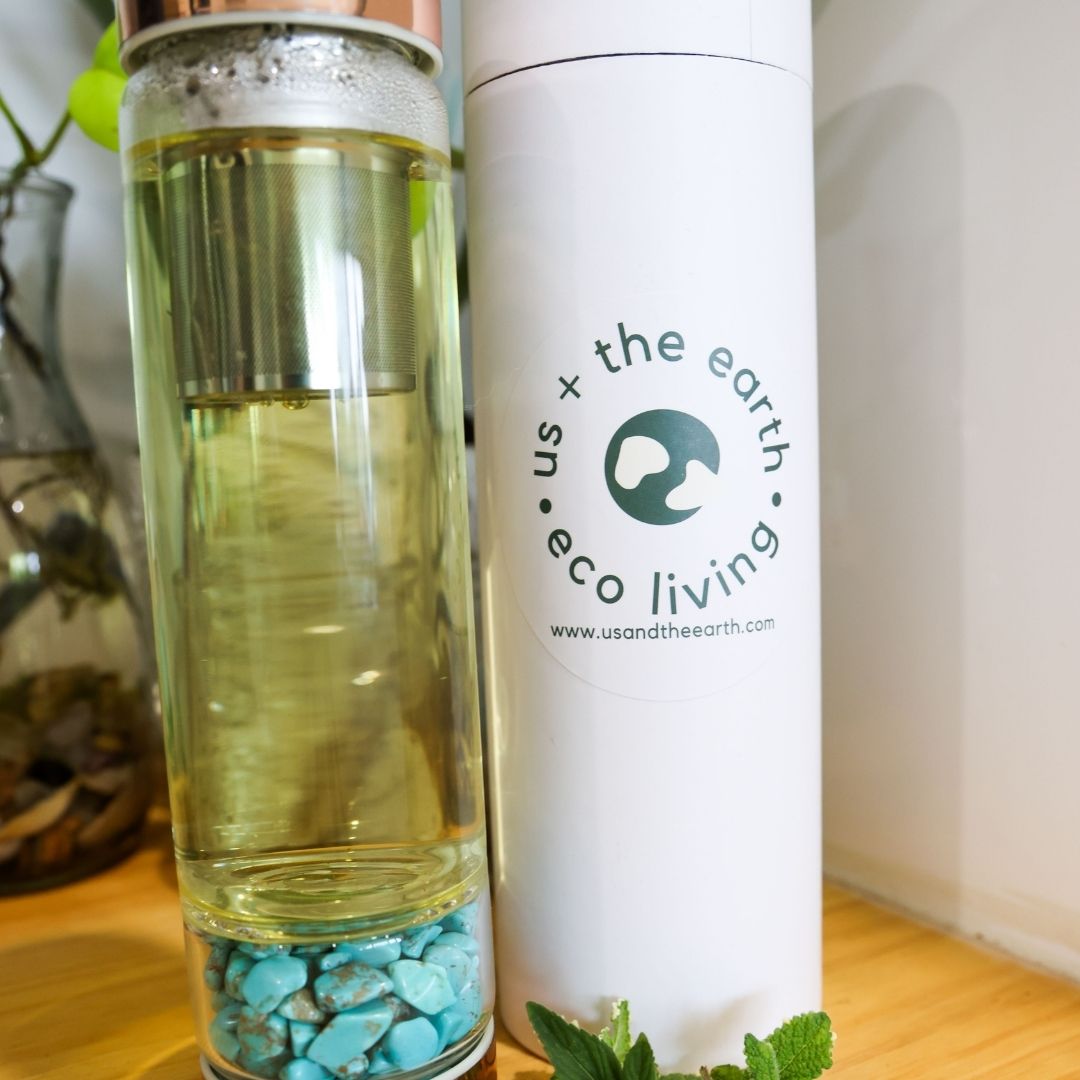 V573-CWBGBSQ-140183-00 Rose Gold Crystal Bottle with Gemstone Base and Tea Infuser - Image 1