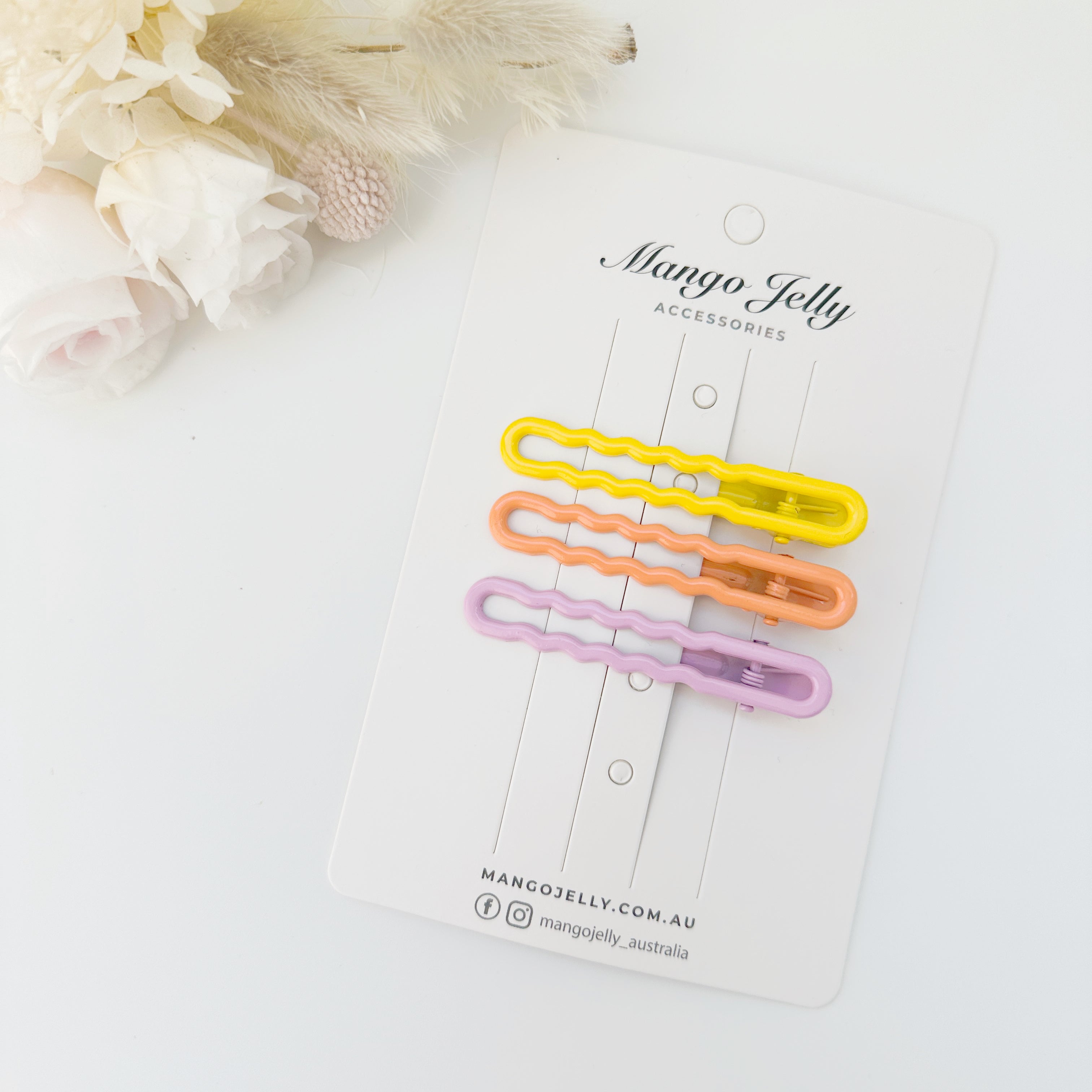 V659-HC-GLOSSWAVY-CANDY-1-M-160778-00 MANGO JELLY Gloss Glaze Wavy Hair Clips - Candy - One Pack - Image 1