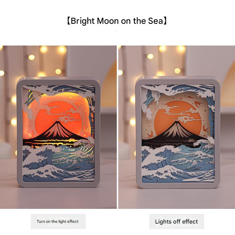 V888-ELOSUNG13586-212238-00 Moon Over The Sea 3D Paper Carving Night Light - USB Or Battery Powered Decorative Bedside Lamp | Atmosphere Lamp for Bedroom | Creative Starry Night and Little Prince Design Gift - Image 1