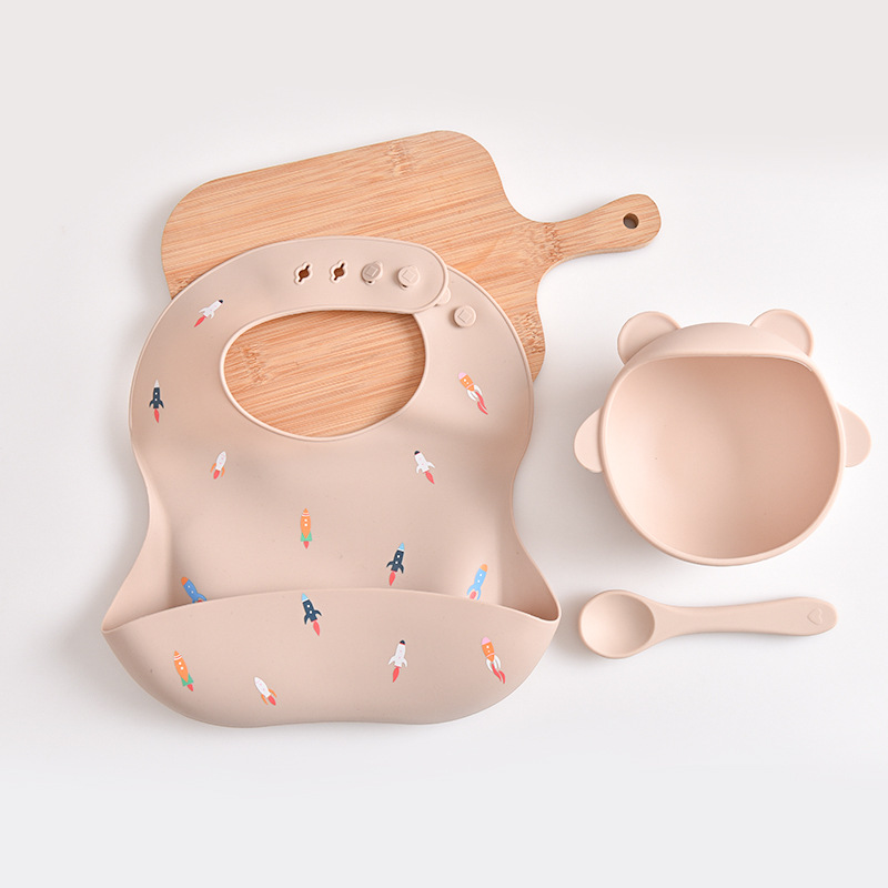 V888-ELOSUNG17457-216109-00 Rocket Pattern Beige Soft and Safe Silicone Baby Feeding Set - Bib, Bowl, and Spoon Combo for Mess-Free Meals - Image 1