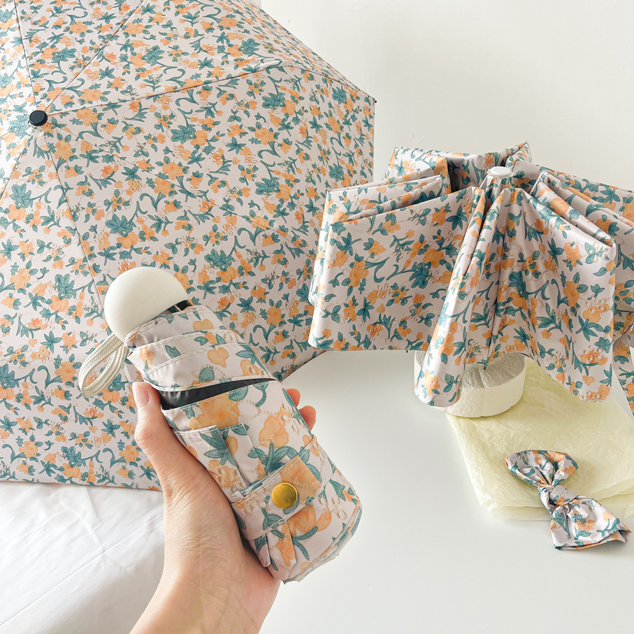 V888-ELOSUNG22289-202503211606-00 Yellow And Green Floral Mini 5-Fold Umbrella - Portable, Anti-UV, Black Glue Coating - Image 1