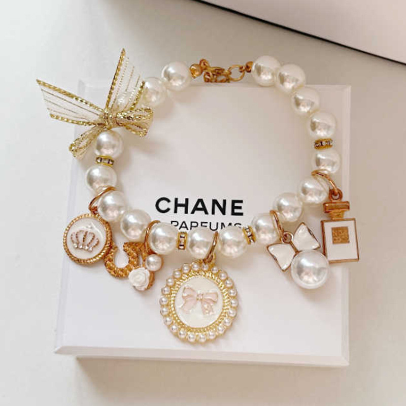 V888-ELOSUNG22524-202503271959-00 White 4-PCS Pearl Charm Pet Necklace - Adjustable Bowknot Collar for Small Dogs & Cats (S: 20+5CM) - Image 1