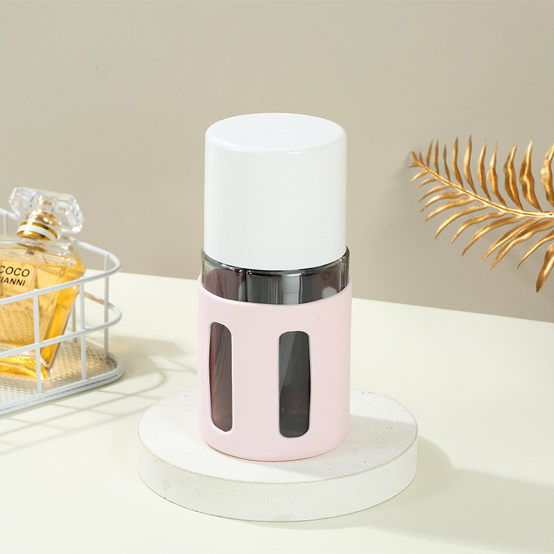 V888-ELOSUNG22541-202503272105-00 Round Pink 2-Piece 4-in-1 Travel Dispenser Set-Leakproof Refillable Bottles for Toiletries - Image 1