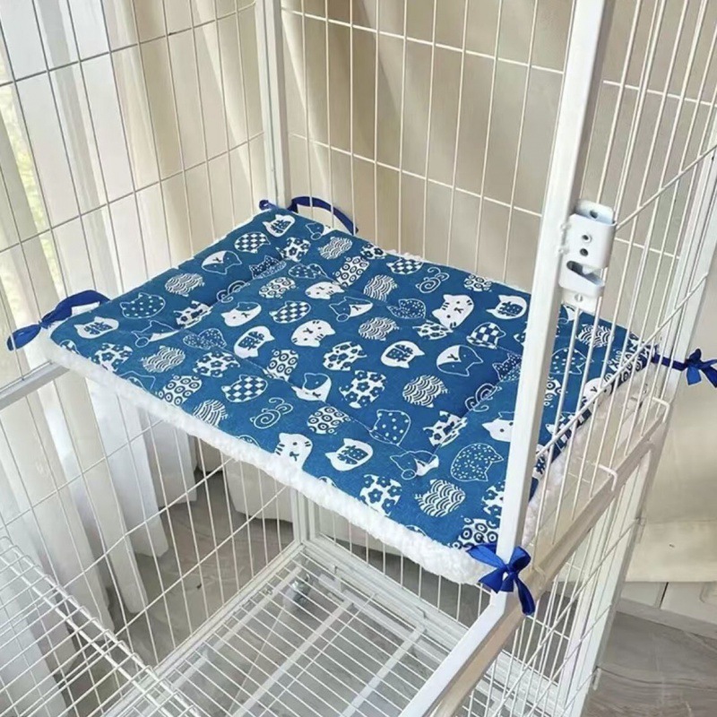 V888-ELOSUNG22835-202504141347-00 Tie-On Cat Cage Platform Pad - white cat pattern on Blue background (30x75cm) - Image 1