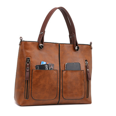 V888-ELOSUNG25020-202504141440-00 Versatile Brown Tote with Detachable Strap - Ideal for Travel - Image 1