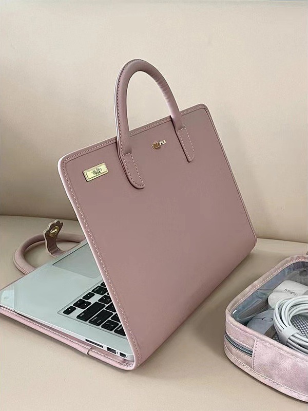 V888-ELOSUNG25110-202504141341-00 Stylish Leather Laptop Sleeve with Handle and Perforated Design - Soft Pink Color - Image 1
