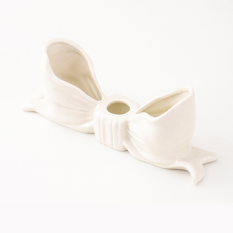 V888-ELOSUNG27212-202504281607-00 White Elegant Ceramic Bow Taper Candle Holder - Stylish Tabletop Decor Accent - Image 1