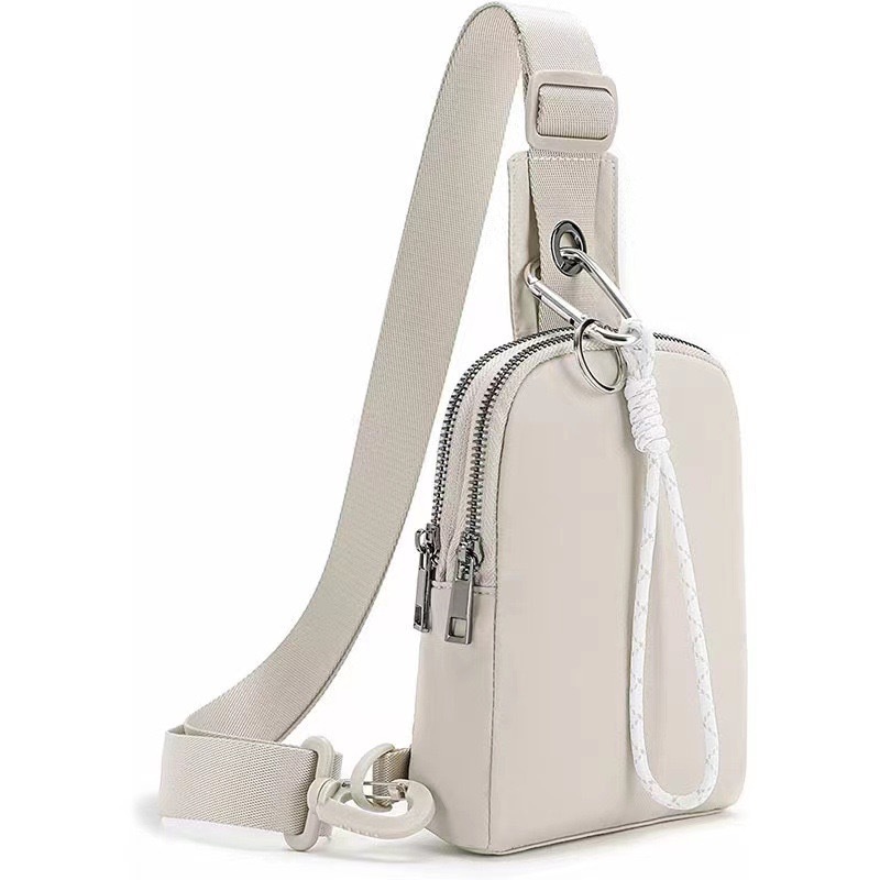 V888-ELOSUNG32611-202506241021-00 Beige Compact Waterproof Sling Bag - Unisex Mini Crossbody Chest Pack with Adjustable Reversible Strap - Image 1