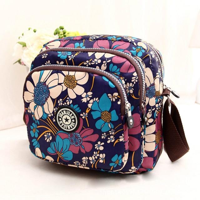 V562-A1039221110DBT-202508291131-00 Waterproof Nylon Multilayer Crossbody Bag For Women - Purple Flower - Image 1