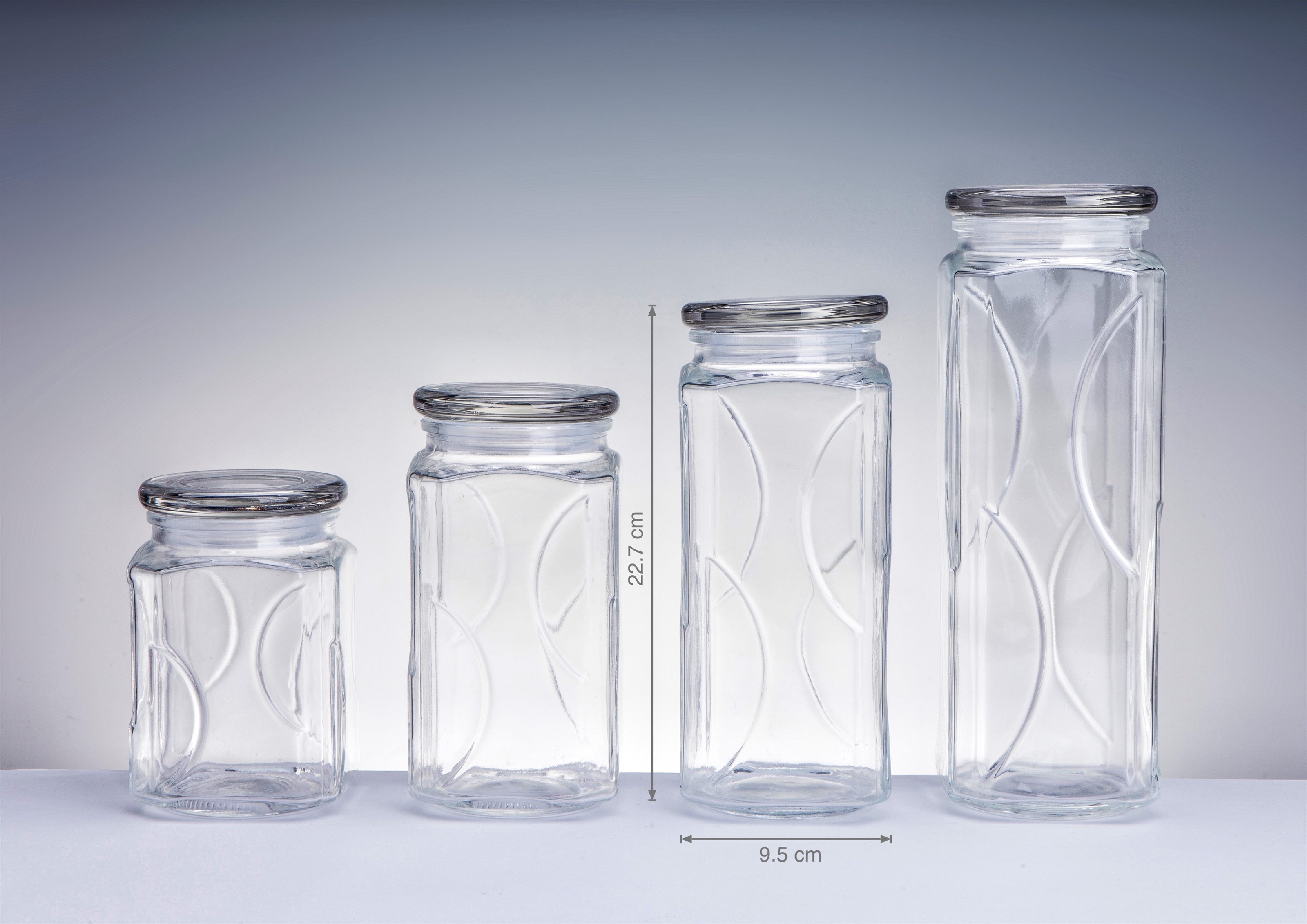 V637-KIT31845-202508252252-00 bulk 12 Swirl Embossed Squ Glass Jar w Glass Lid 22cm - Image 1